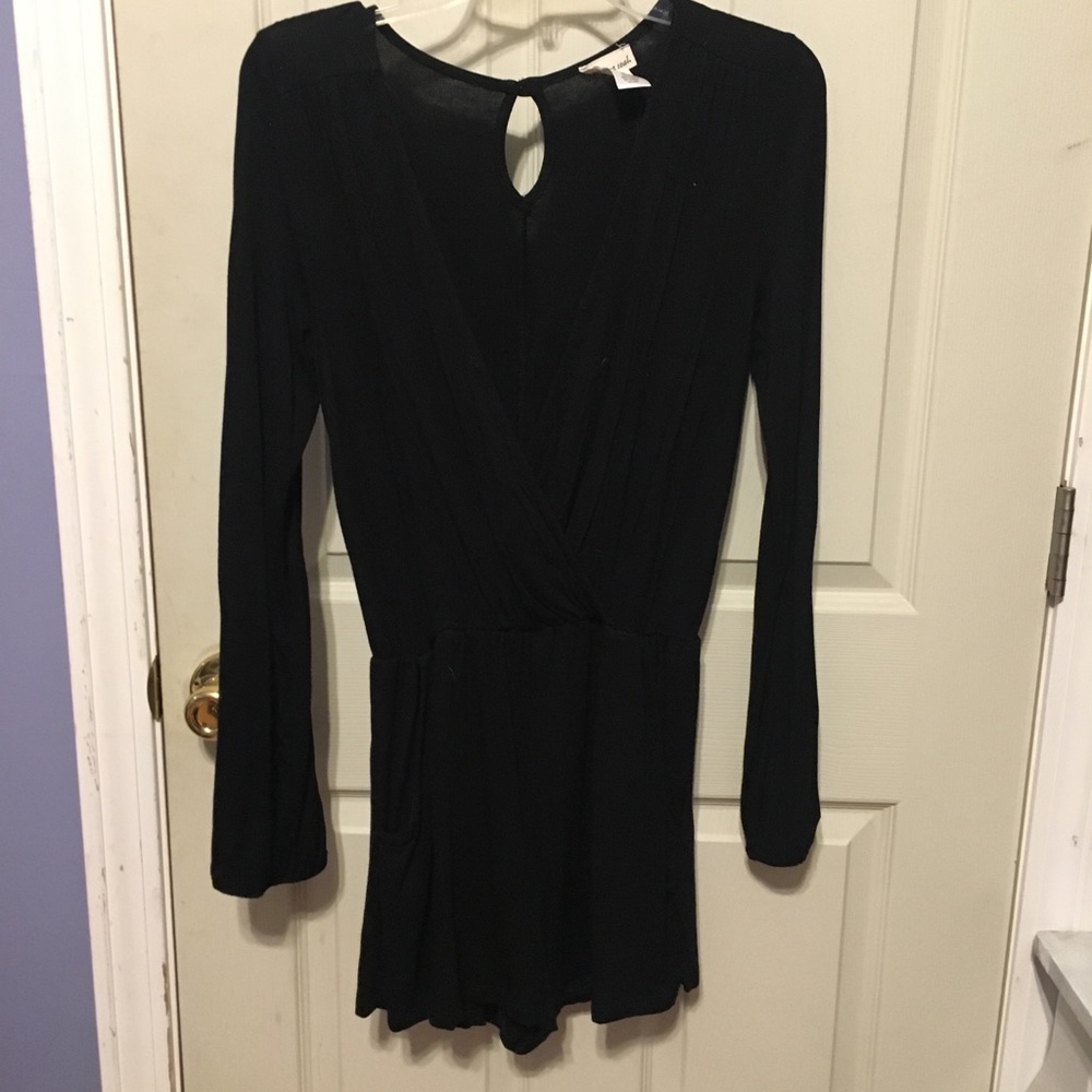 Plunging black romper